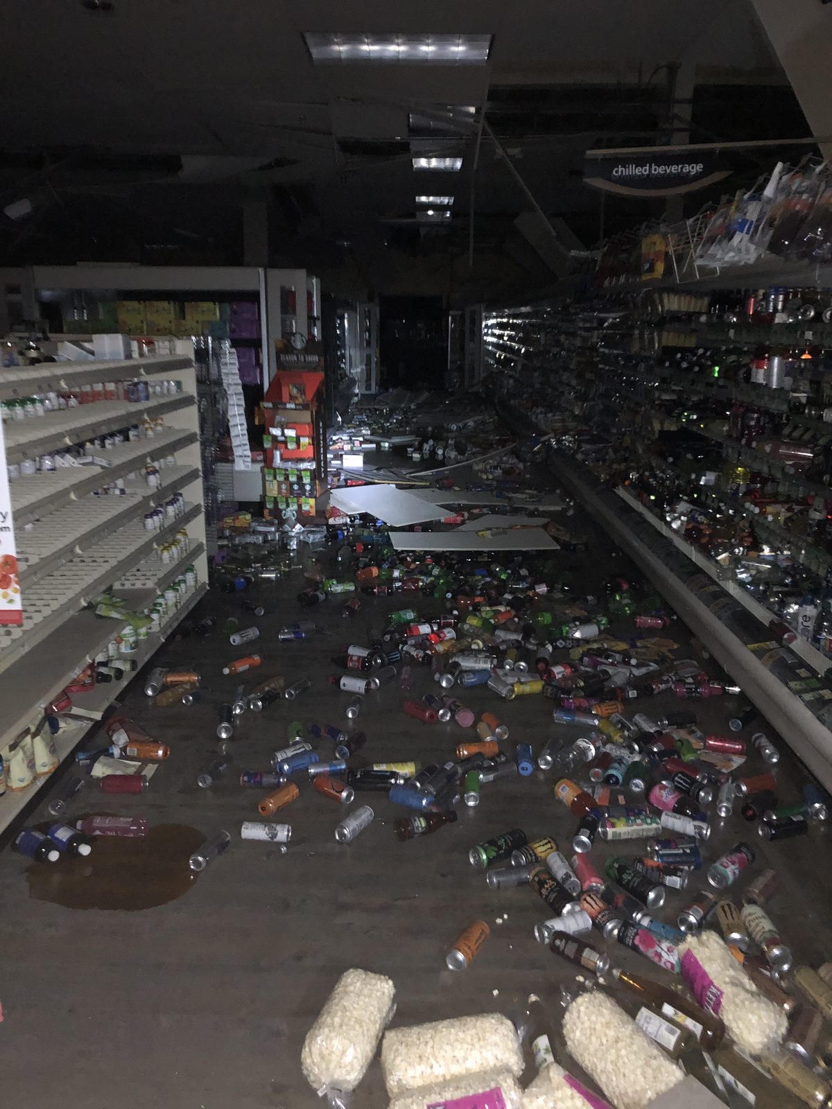 Product thrown across darkened store aisles by the earthquake